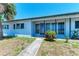 Charming single story home with covered entry and beautifully maintained lawn at 149 Roselle Ct, Port Charlotte, FL 33952