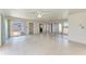 Bright living room featuring sliding glass doors and neutral toned flooring at 149 Roselle Ct, Port Charlotte, FL 33952