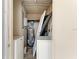 Small utility room with stacked washer and dryer at 149 Roselle Ct, Port Charlotte, FL 33952