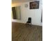 Inviting living area with modern wood-look flooring, neutral walls, and soft natural light at 744 Myrtle Ave, Venice, FL 34285