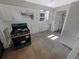 A bright kitchen area featuring white subway tile backsplash and modern appliances at 1715 Delaware Ne Ave, St Petersburg, FL 33703