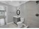 A clean, renovated bathroom featuring a sink with updated fixtures and a walk-in shower at 1937 N Highland Ave, Clearwater, FL 33755