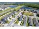 Beautiful overhead perspective of a community nestled beside serene lakes and lush green spaces at 13001 Pennybrook Dr, Riverview, FL 33579