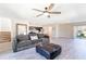 Cozy living space featuring an open floor plan, connecting to the kitchen with stainless steel appliances at 13001 Pennybrook Dr, Riverview, FL 33579