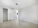Bedroom featuring smooth surface floors and a closet with sliding doors, offering ample storage at 1540 David Pl, Englewood, FL 34223
