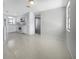 Bright kitchen with white appliances and cabinetry offering plenty of space for cooking and storage at 1540 David Pl, Englewood, FL 34223