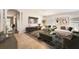 Inviting living room with modern decor, neutral tones, and stylish furnishings for comfortable living at 19012 Quarry Badger Rd, Land O Lakes, FL 34638