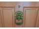 Close up view of front door showcasing lion head door knocker at 5769 E Price Blvd, North Port, FL 34288