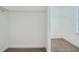 Bright walk-in closet featuring shelving, carpet, and base trim at 6160 Castleton Hollow Rd, Riverview, FL 33578