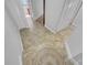 Tiled entryway with coat closets and white trim at 557 Pinellas Bayway S # 111, St Petersburg, FL 33715