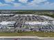 Wide aerial view of the bustling shopping center with a variety of stores and parking facilities at 12654 Oak Hill Way, Parrish, FL 34219