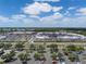 An expansive aerial view of the shopping center, showcasing its variety of stores and parking at 12654 Oak Hill Way, Parrish, FL 34219