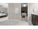 A spacious bathroom leading to the main bedroom and a walk-in closet at 12654 Oak Hill Way, Parrish, FL 34219