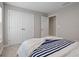Bright bedroom with a plush bed, large closet, and inviting natural light at 12654 Oak Hill Way, Parrish, FL 34219