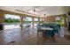Indoor seating area in the community clubhouse with outdoor pool views at 12654 Oak Hill Way, Parrish, FL 34219