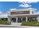 The exterior of the First Watch restaurant, highlighting its stone facade and modern design at 12654 Oak Hill Way, Parrish, FL 34219