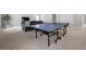 A spacious game room with a ping pong table and comfortable seating at 12654 Oak Hill Way, Parrish, FL 34219