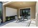 Relaxing patio with furniture, retractable shades, and outdoor living at 12654 Oak Hill Way, Parrish, FL 34219
