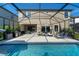 Beautiful pool and patio area for outdoor living and entertaining at 12654 Oak Hill Way, Parrish, FL 34219