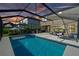 Tranquil pool area with spacious patio and serene sunset view at 12654 Oak Hill Way, Parrish, FL 34219