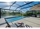 Screened pool and patio with outdoor kitchen and lake views at 12654 Oak Hill Way, Parrish, FL 34219