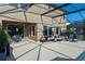 Screened-in pool area with ample patio space and comfortable seating at 12654 Oak Hill Way, Parrish, FL 34219