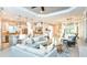 Spacious open concept layout with comfortable seating and a kitchen featuring stainless steel appliances at 6237 Plateau Ct, Bradenton, FL 34203