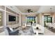 Bright and airy living room with comfortable seating, neutral colors, and an open layout at 6237 Plateau Ct, Bradenton, FL 34203
