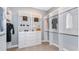 Walk-in closet featuring custom shelving and drawers to maximize closet storage and organization at 6237 Plateau Ct, Bradenton, FL 34203