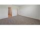 Spacious bedroom featuring neutral walls, plush carpet, and ample natural light at 31622 Malbec Ln, Brooksville, FL 34602