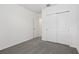 Bright bedroom with gray carpet and closet at 31673 Wild Grape Sw Ln, Brooksville, FL 34602
