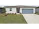 Charming single-Gathering home with a well-manicured lawn and a two-car garage at 31673 Wild Grape Sw Ln, Brooksville, FL 34602