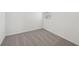 Bedroom featuring neutral carpet and natural light through window with blinds at 3561 Moscato Dr, Brooksville, FL 34602