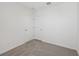 Bedroom featuring neutral carpet, natural light, and a double-door closet at 3561 Moscato Dr, Brooksville, FL 34602