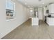 Sun-filled living space featuring sleek tiled flooring at 3561 Moscato Dr, Brooksville, FL 34602