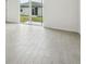 Bright living room with large sliding doors at 3561 Moscato Dr, Brooksville, FL 34602