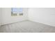 Bedroom with plush carpeting, natural light and neutral color palette at 3568 Moscato Dr, Brooksville, FL 34602