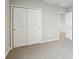 Bedroom features a carpeted floor, closet with sliding doors and ensuite bathroom entrance at 3824 Radiant Mountain Dr, Plant City, FL 33565
