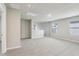 Bright bonus room offers neutral paint, carpet, recessed lighting, natural light, and an open staircase at 3824 Radiant Mountain Dr, Plant City, FL 33565