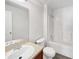 Clean and functional bathroom with white fixtures and a shower-tub combination at 5211 Mango Fruit St, Seffner, FL 33584