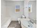 Clean bathroom features a shower, vanity, and neutral walls at 5211 Mango Fruit St, Seffner, FL 33584