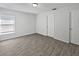 Spacious bedroom features a window, neutral walls, and modern flooring at 5211 Mango Fruit St, Seffner, FL 33584