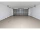 Spacious garage with white walls and floor at 5211 Mango Fruit St, Seffner, FL 33584