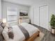 Cozy bedroom featuring a comfy bed, soft rug, and ample closet space at 5211 Mango Fruit St, Seffner, FL 33584