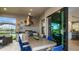 This outdoor dining area provides ample seating with seamless access to the indoor kitchen and living area at 6243 Plateau Ct, Bradenton, FL 34203