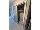 Bedroom closet with sliding door, shelves, and hanging rod for organized storage solutions at 8111 Lakewood Main St # 207, Lakewood Ranch, FL 34202