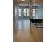 Living space with black countertops, views and lots of lighting at 8111 Lakewood Main St # 207, Lakewood Ranch, FL 34202