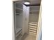 Walk-in closet featuring custom shelves, drawers, and ample storage space for clothing and accessories at 8111 Lakewood Main St # 207, Lakewood Ranch, FL 34202