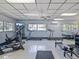 Bright community fitness center with treadmills, elliptical, and weight equipment for residents' exercise needs at 840 Virginia St # 202, Dunedin, FL 34698