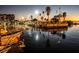 View of boats docked on the marina during sunset at 840 Virginia St # 202, Dunedin, FL 34698